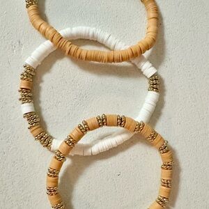 Tan and White with gold accents Clay Beaded Bracelet Set.    Homemade